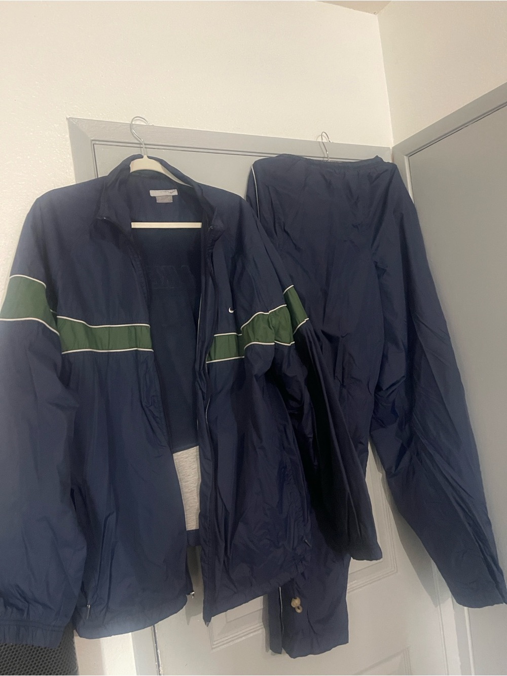 Nike Navy Windbreaker Jacket with Green Stripe and White Trim and pants